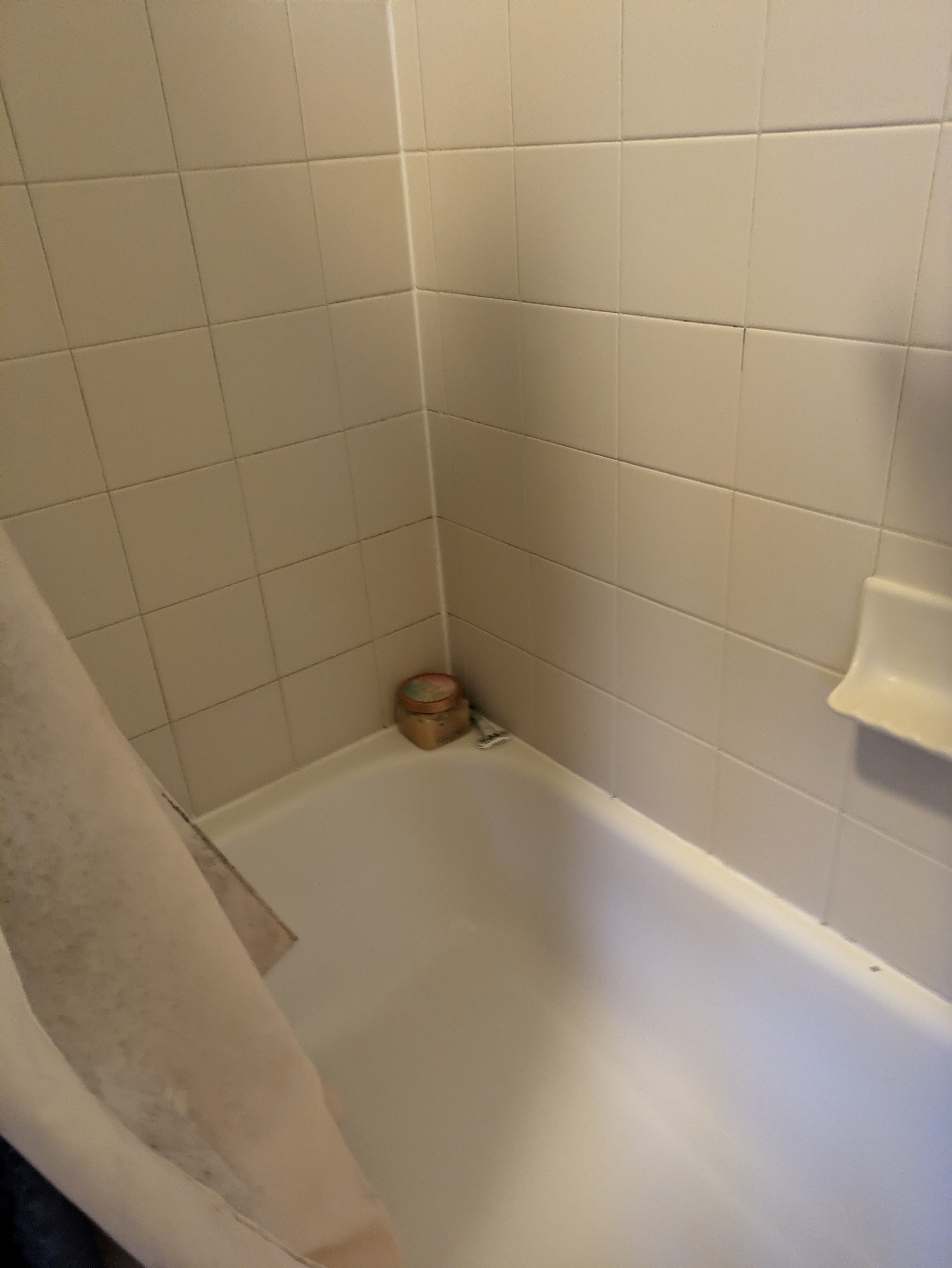 Floor tile layout and spacing in Normaltown bathroom remodel